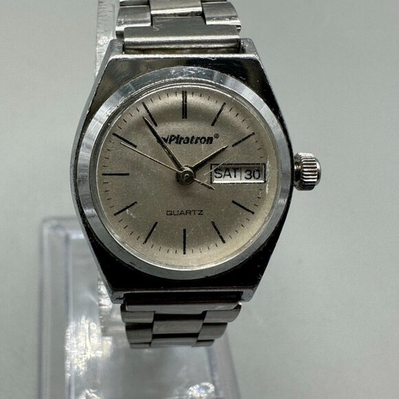 3/$30 Piratron Watch Women Silver Tone Day Date Quartz Classic Look 6.7 - Picture 1 of 15